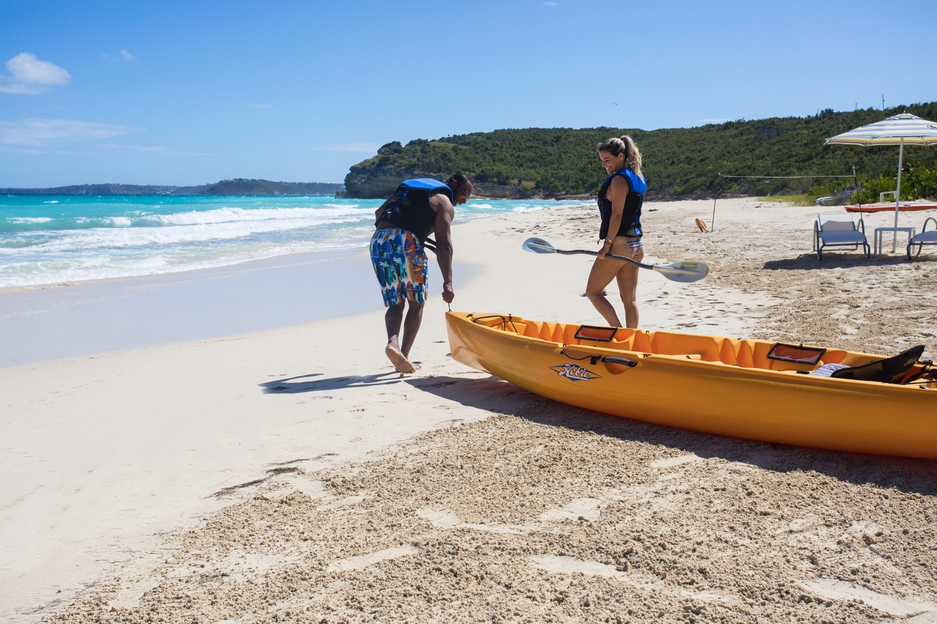 Kayak or paddleboard across the tranquil turquoise water - Long Bay Villas 